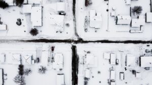 snowy suburban roofs need snow brackets 